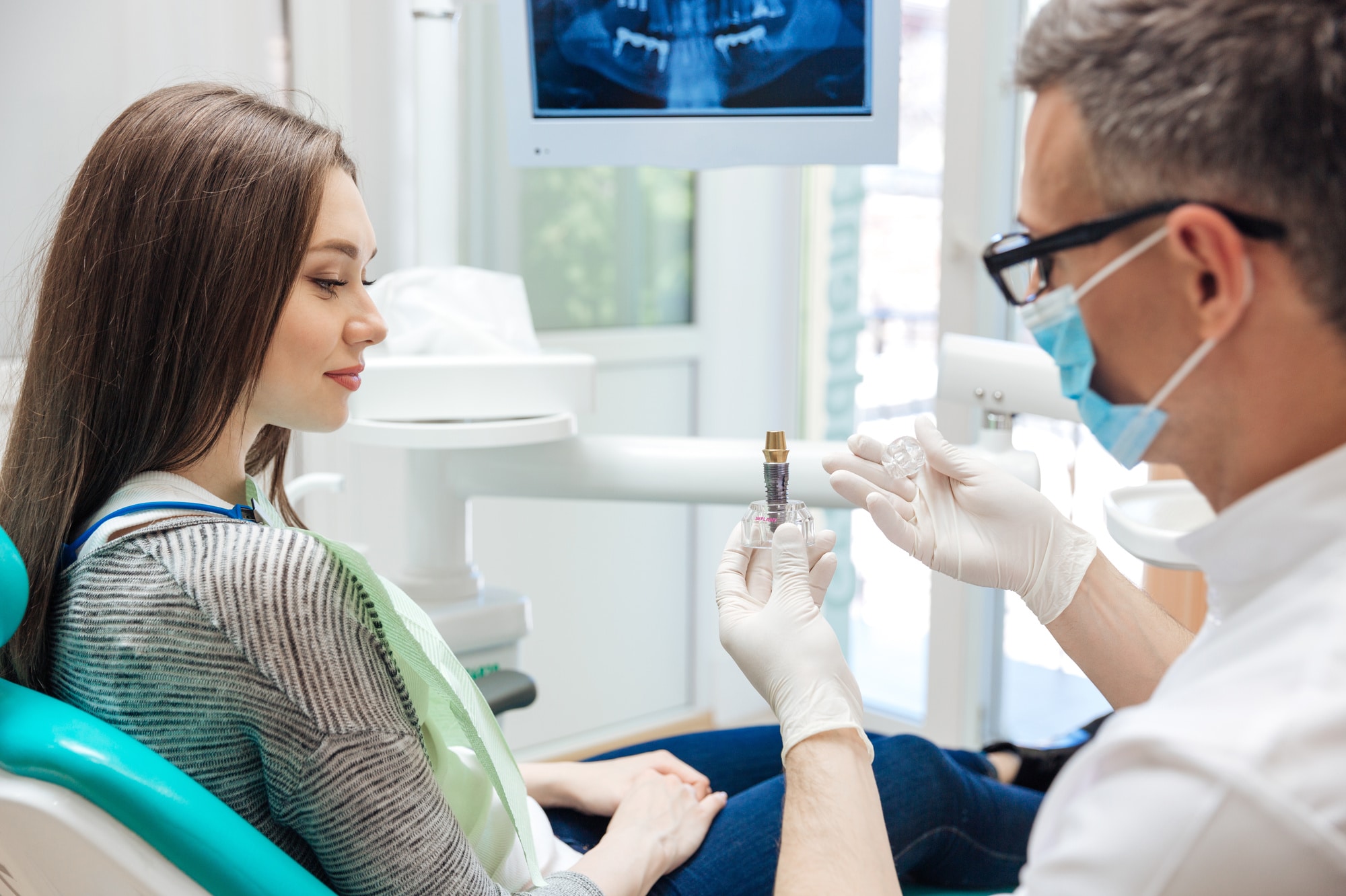 A Patient's Complete Guide for Dental Implant Aftercare | Alicia Dental